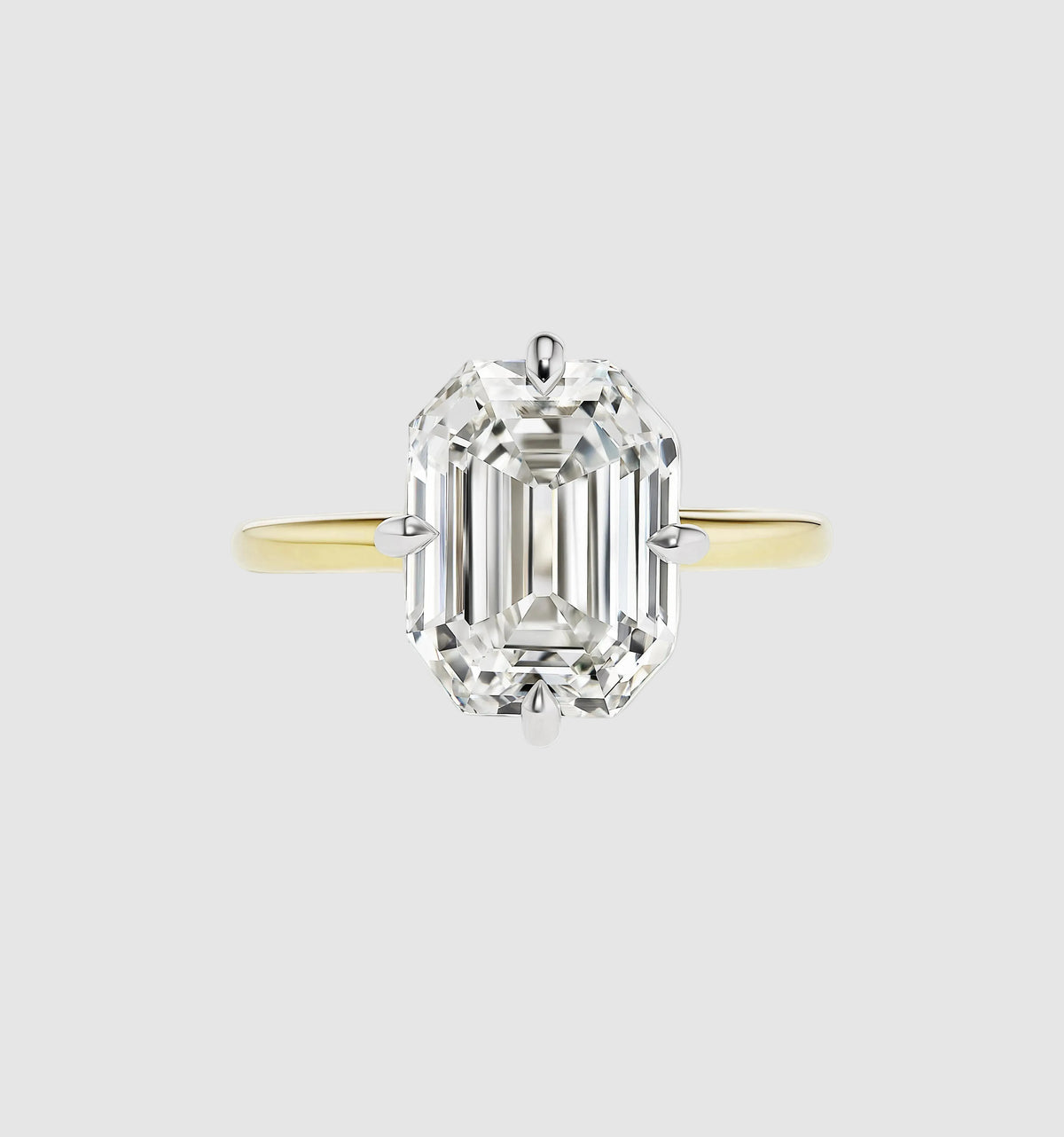 Emerald Compass Prong Engagement Ring